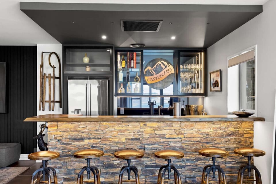 Your own private bar equipped with a full size fridge, sink and dishwasher.