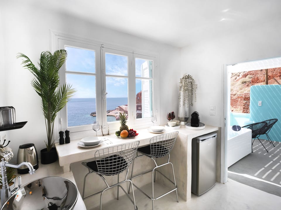 Exclusive Studio Suite, 1 Queen Bed, Hot Tub, Sea View | Living area | TV, Netflix, streaming services