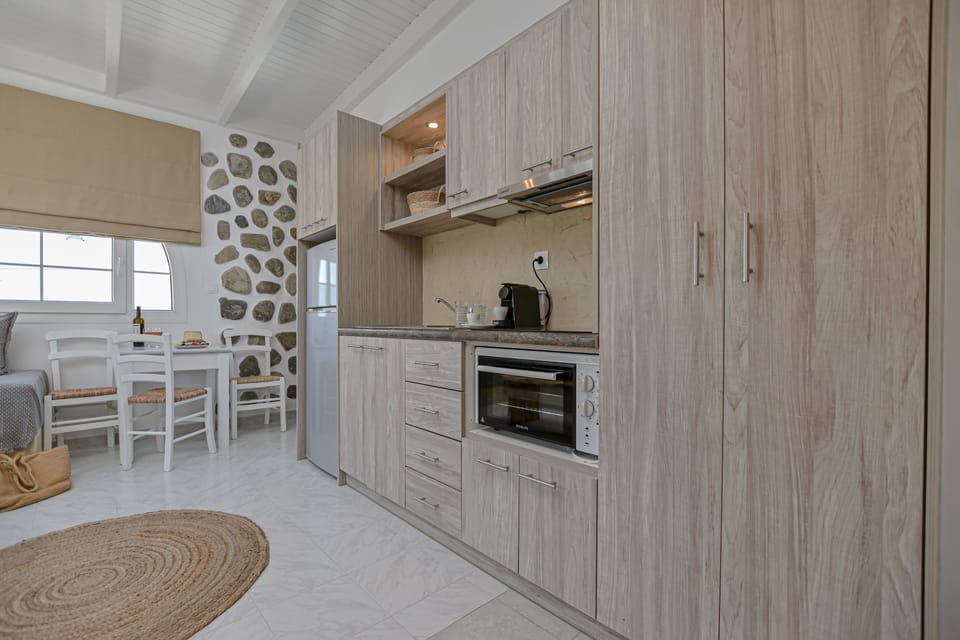 Superior Apartment | Private kitchen | Espresso maker, fridge, electric kettle