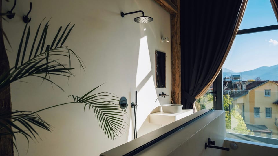 Suite with Bathtub and Terrace | Bathroom | Hair dryer, slippers, towels, soap