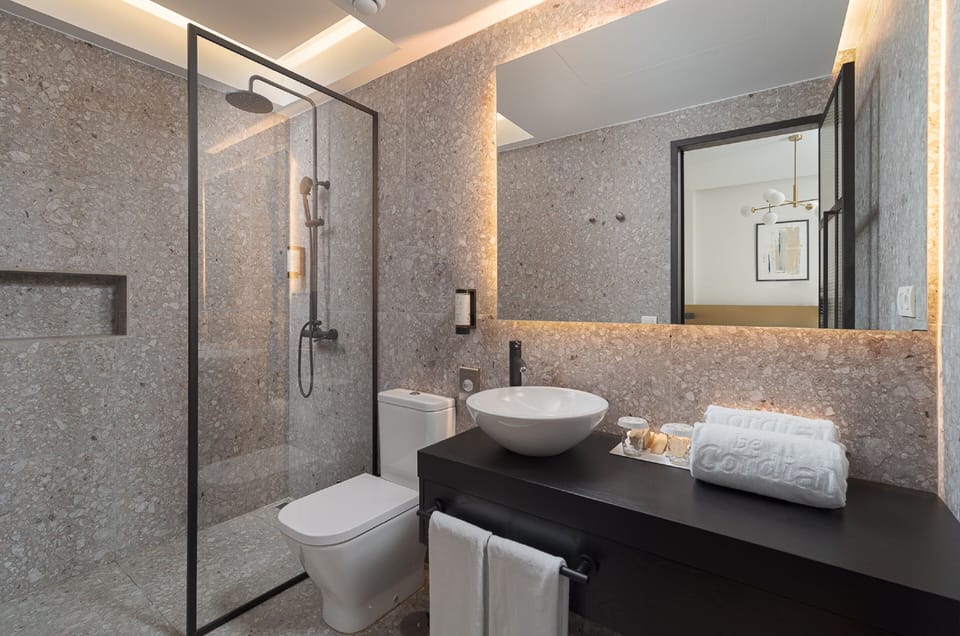 Classic Room | Bathroom | Shower, rainfall showerhead, hair dryer, bathrobes