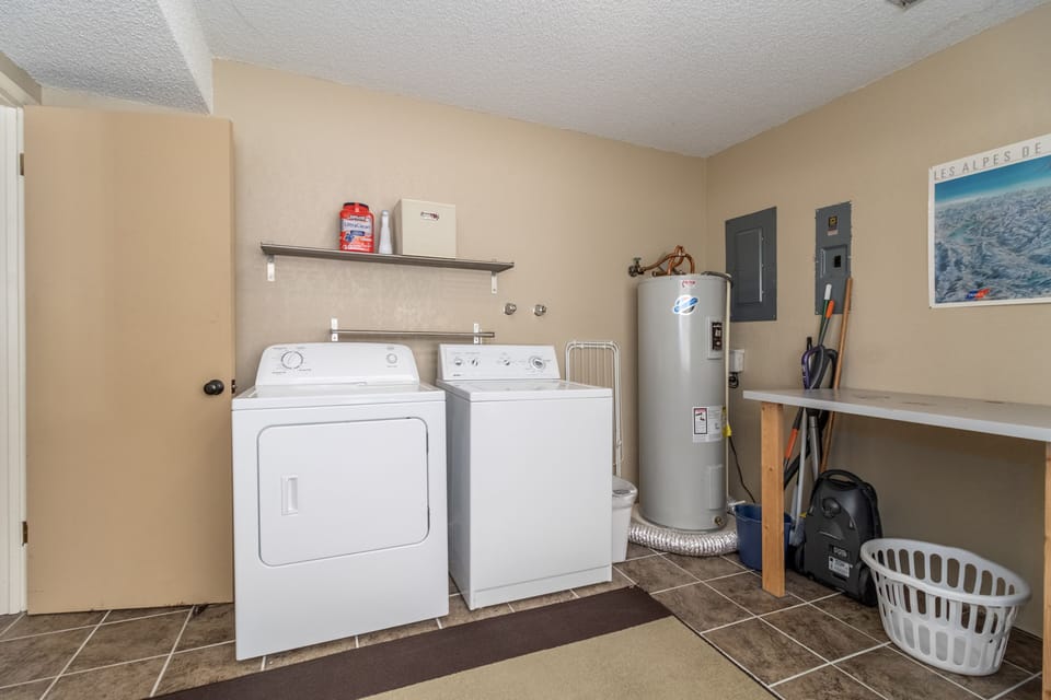 Lower level laundry area with washer and dryer