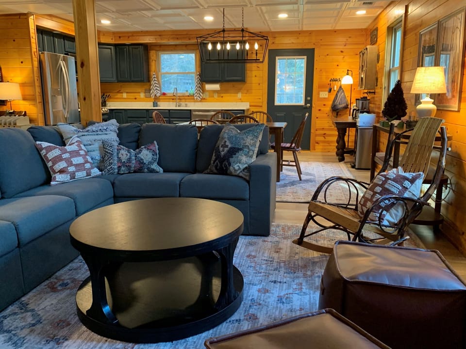 View from Sunroom into Great Room and Kitchen