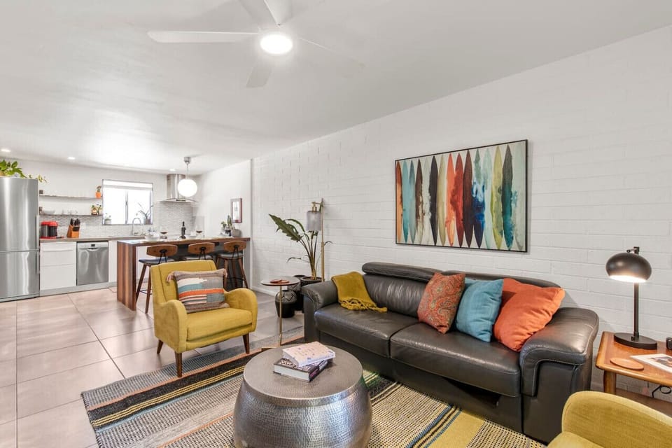 An open floor layout with the kitchen and the living room for socializing.