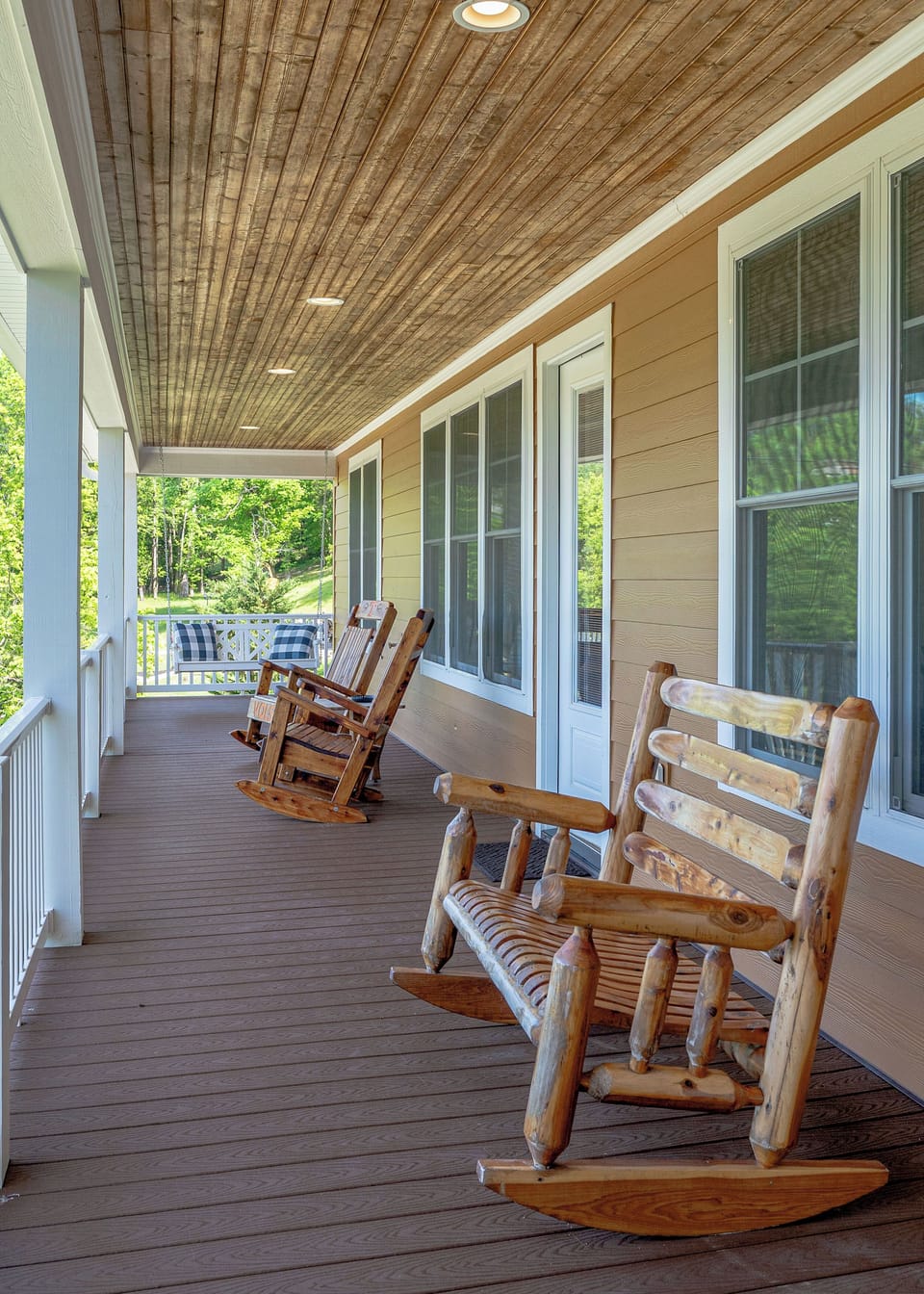 Relax on the front porch with rocking chairs and swings, perfect for coffee.