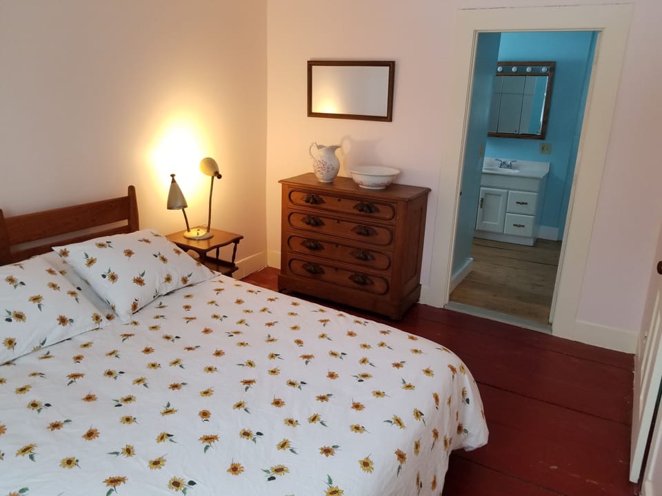 Bedroom 1 has direct access to the main bathroom.