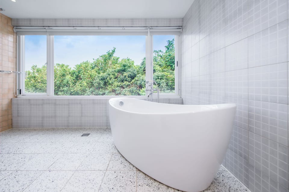Duplex Quadruple Room | Bathroom | Free toiletries, hair dryer, slippers, towels