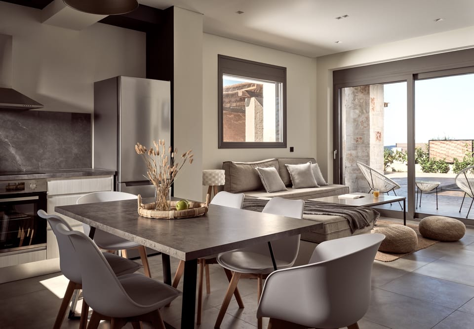 Indoor dining spot, is also featured at the open plan living-cum space. 