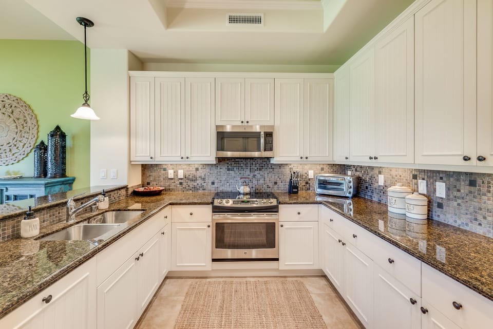 Granite counter tops & stainless steel appliances.