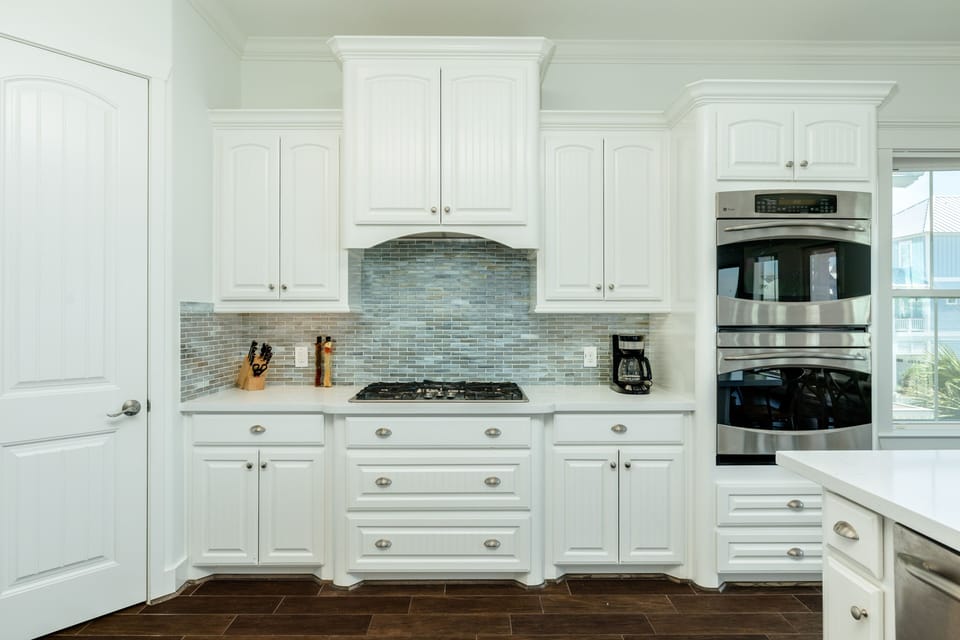 Stainless steel appliances including double oven and gas range