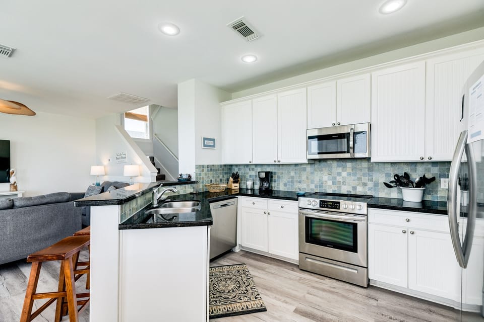 Plenty of counter space in the fully equipped kitchen to make meals at home