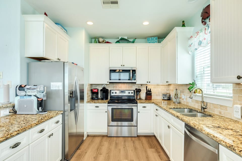Fully equipped kitchen with stainless steel appliances
