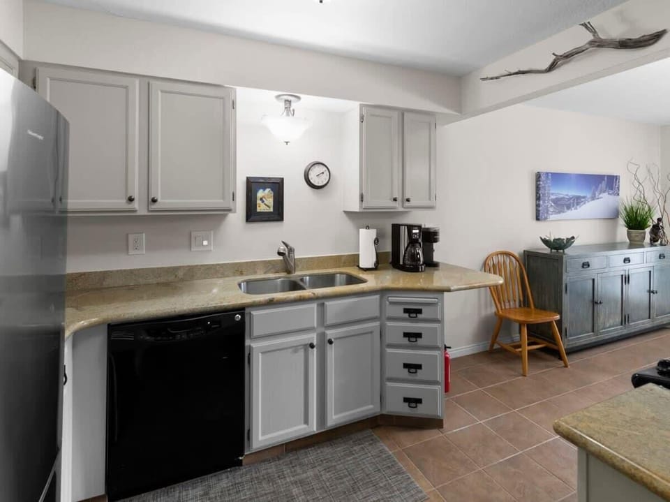 Fully-equipped kitchen with plenty of countertop space and modern appliances