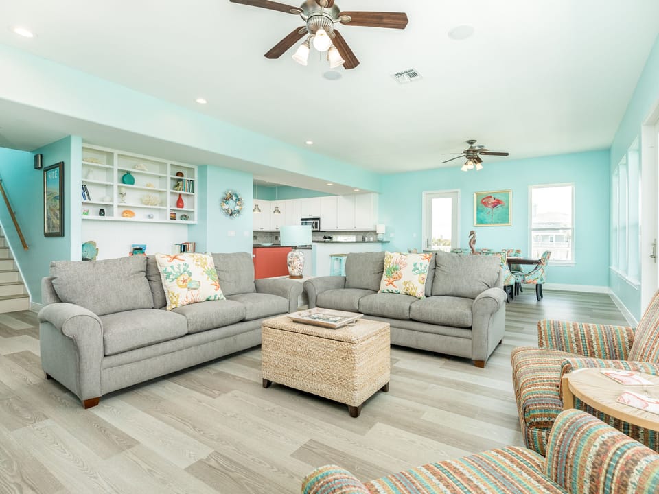 Bright and airy living room with fun coastal color palette