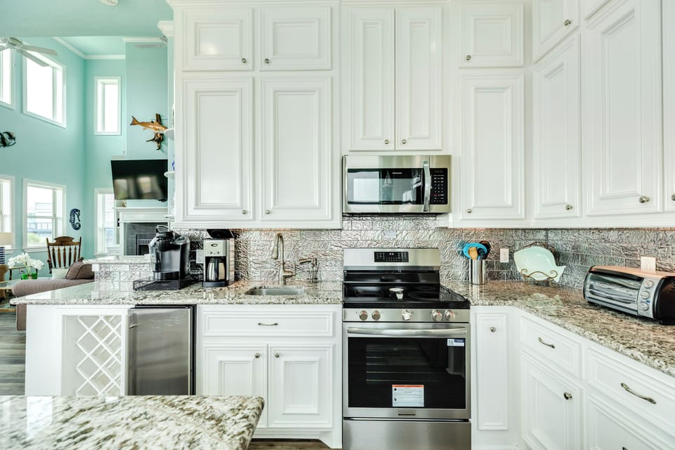 Fully equipped kitchen with stainless steel appliances