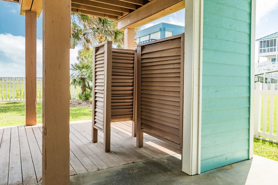 Rinse off in the outdoor shower after a day at the beach