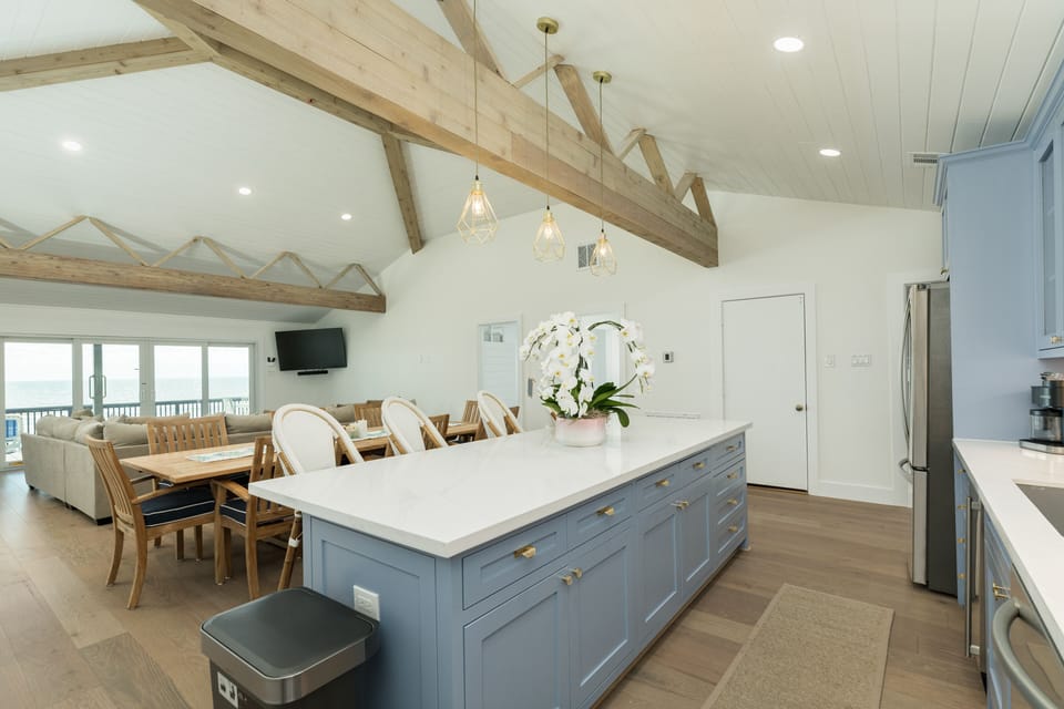 Large kitchen island is great for snacking or serving meals