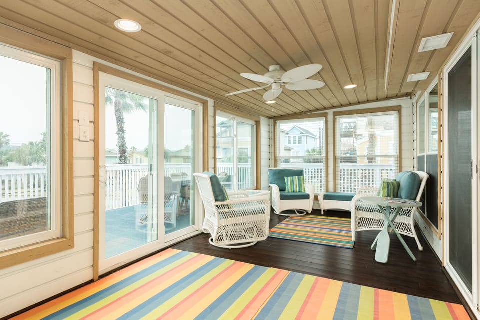 Unwind after a day in the sun in the enclosed sunroom