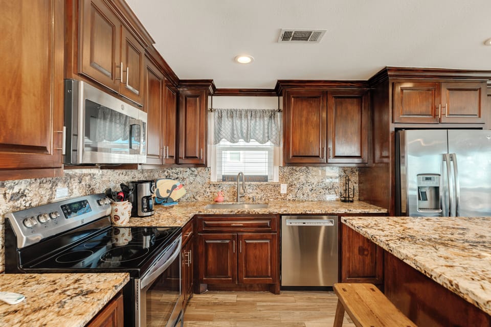 Fully equipped kitchen with stainless steel appliances