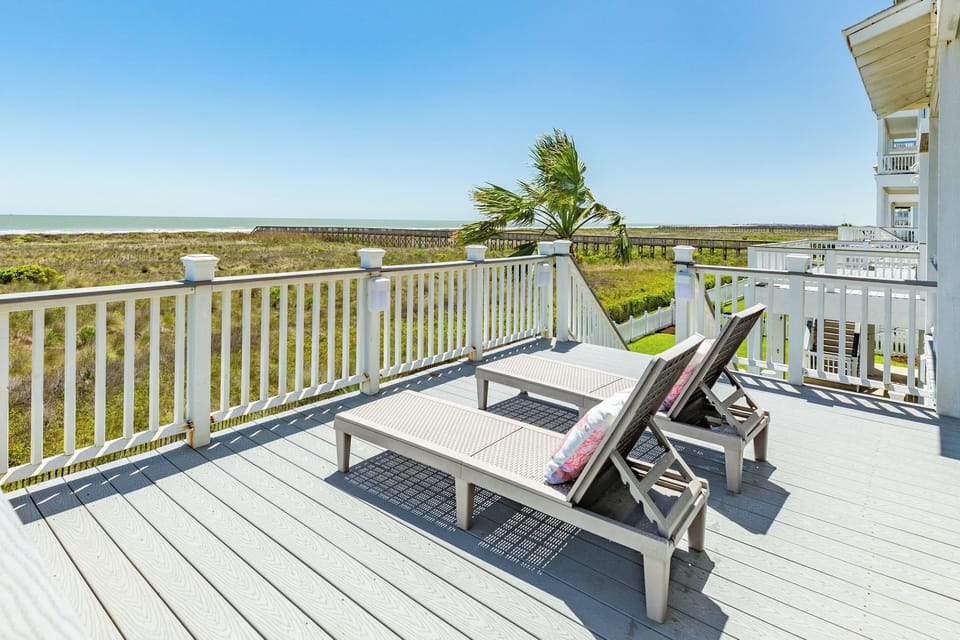 Soak up the island sun on the lounge chairs