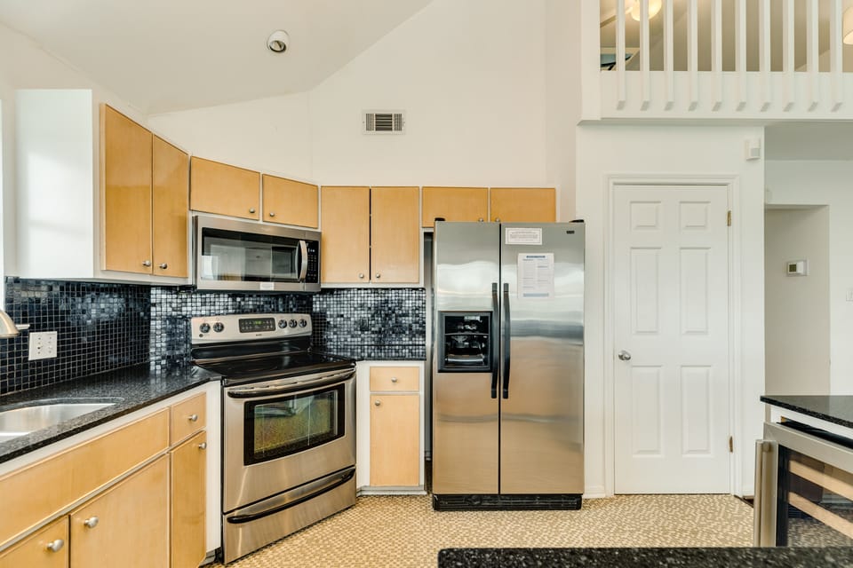 Fully equipped kitchen with stainless steel appliances