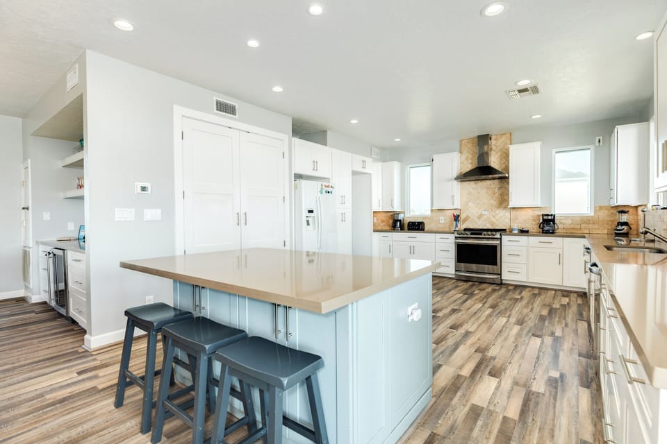 Grab a snack or serve meals at the oversized kitchen island