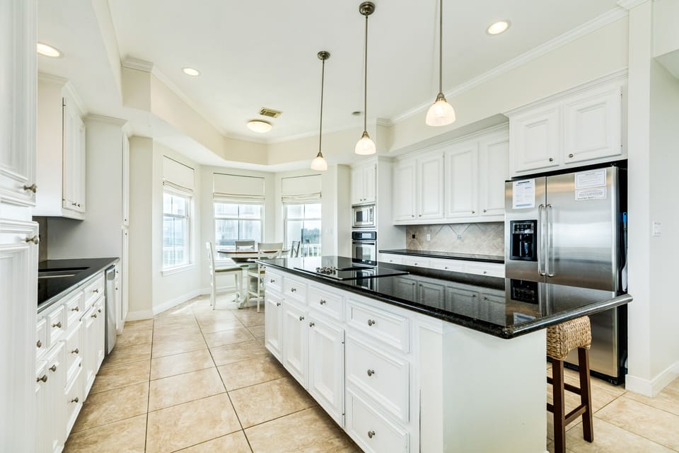 Fully equipped kitchen includes stainless steel appliances and plenty of prep space