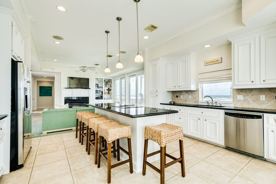 Serve or enjoy meals at the long kitchen island
