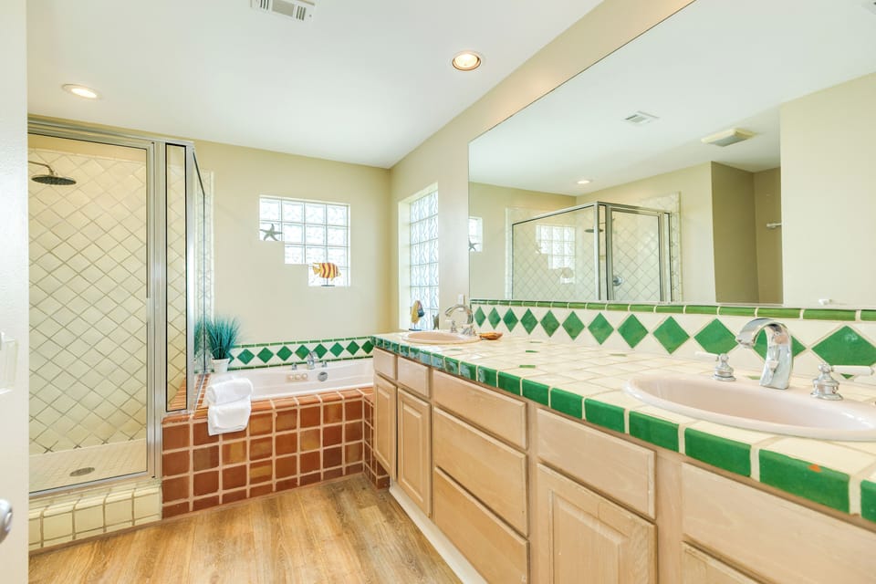 En suite bathroom with tub & shower