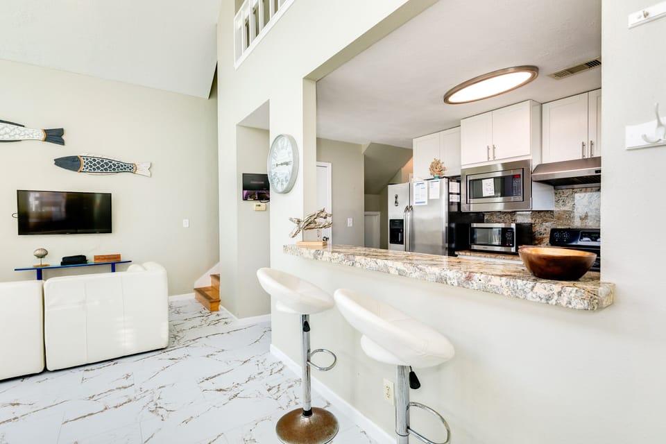 Grab a quick bite to eat at the breakfast bar seating 2