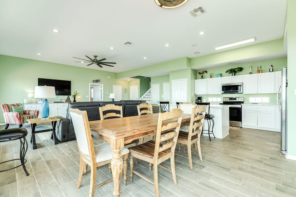 Easily serve homecooked meals from the adjacent kitchen