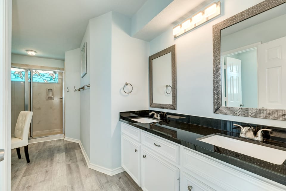 Primary bathroom with dual vanities