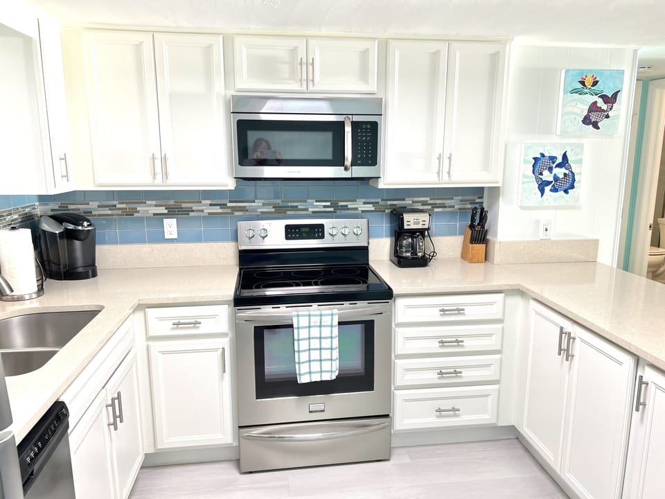 Well appointed kitchen with all necessary to create and serve meals.