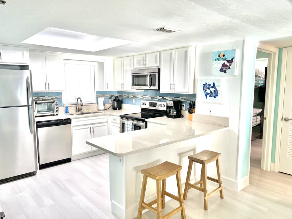 Well appointed kitchen with all necessary to create and serve meals.