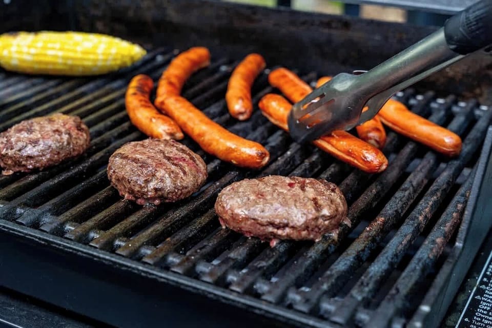 Nothing says summer vibes like the sizzle of hamburgers and hot dogs on the grill. Grab your friends, fire up that outdoor grill, and let the feast begin! 