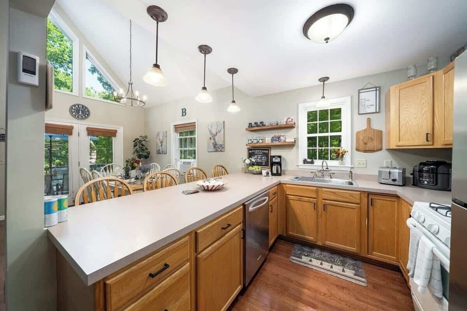 With a spacious island perfect for meal prep and a cozy dining area, it's the ultimate recipe for fun times.