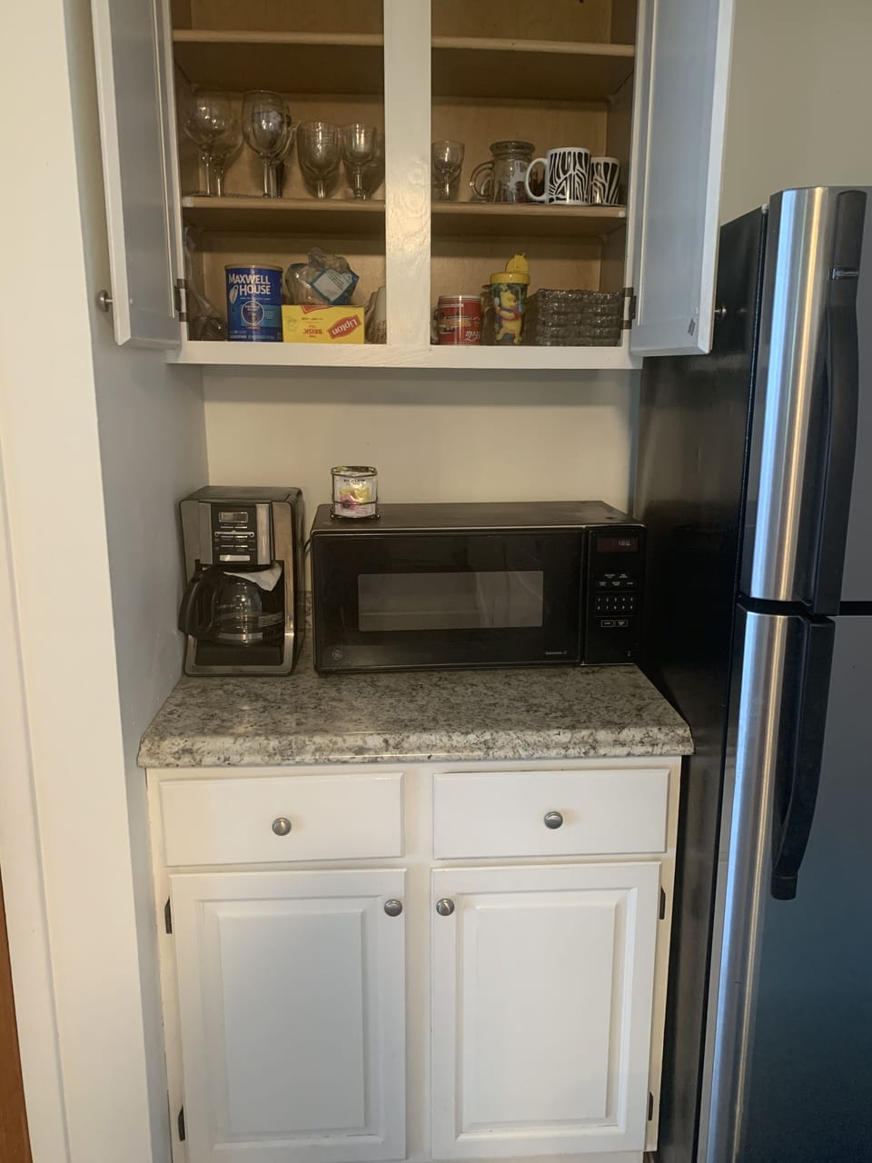 Coffee and microwave counter, some coffee and filters provided.