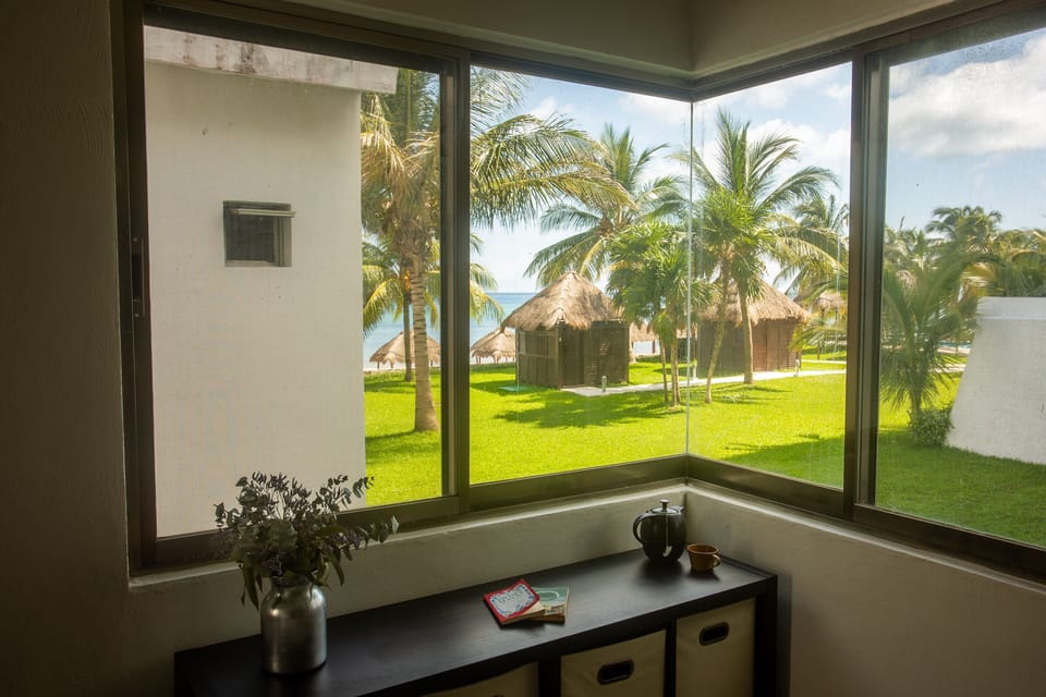 Room 2: 
Ocean view. Queen Bed,  A/C, closet and bathroom