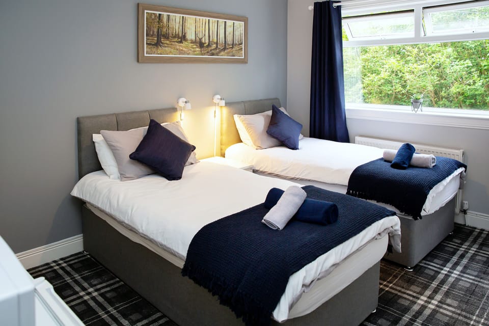 Twin Room | Blackout drapes, iron/ironing board, free WiFi, bed sheets