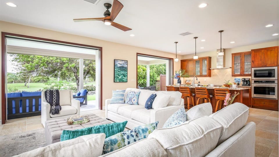 Let the outdoors in with the two sets of floor-to-ceiling glass pocket doors