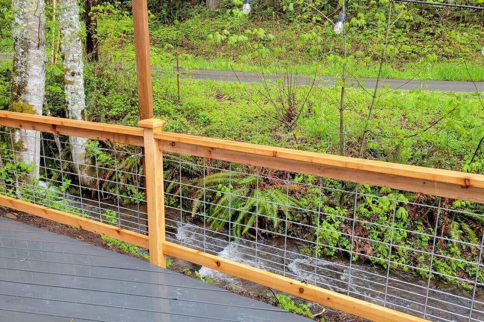 This is your view walking out of the tiny house.  Private whole house cozy cottage on relaxing burbling creek. Gateway to the McKenzie River recreation area where you can enjoy mountain bike riding, rafting, hiking, kayaking, canoeing, camping, tubing, St
