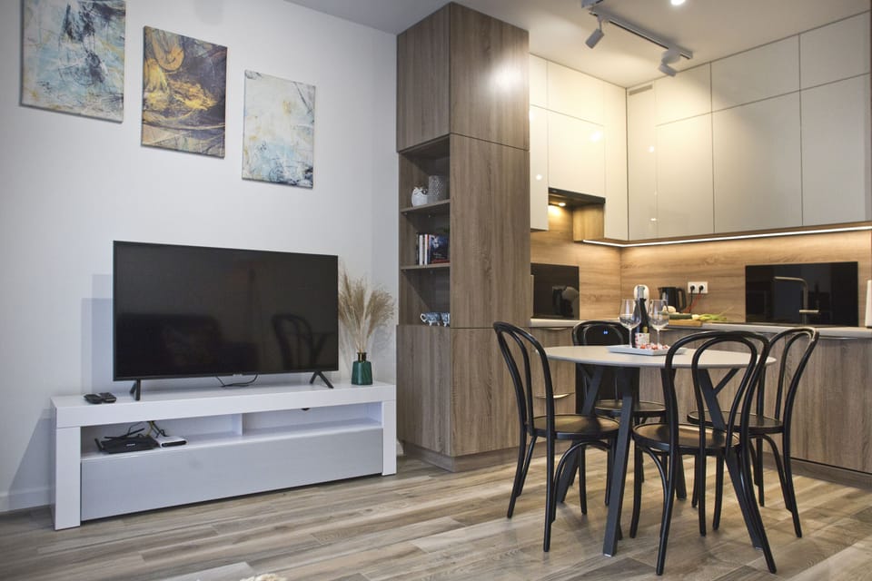 Comfort Apartment | Living room | 40-inch LCD TV with cable channels, TV