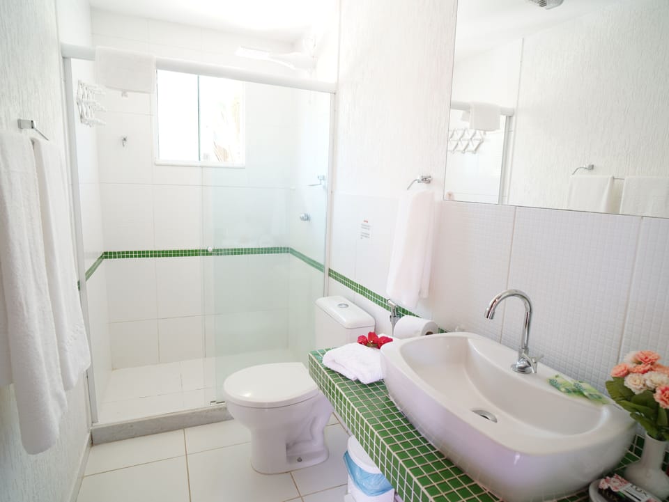 Standard Suite | Bathroom | Shower, hair dryer, towels, soap