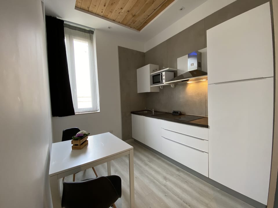Deluxe Studio | Private kitchen | Shared fridge, stovetop, dishwasher, cookware/dishes/utensils