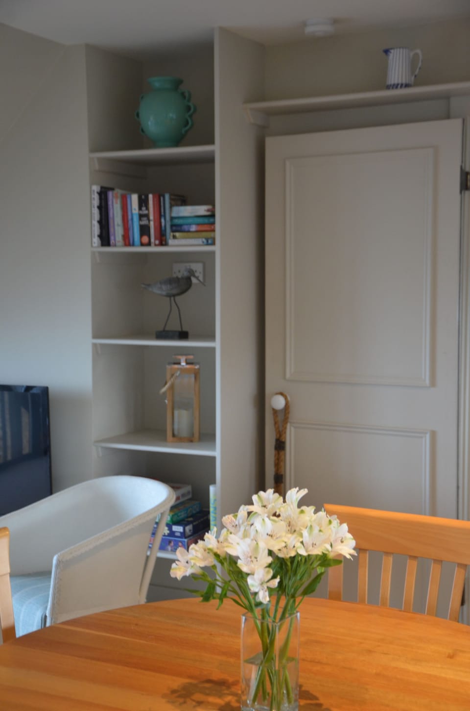 View from dining table towards bookshelf