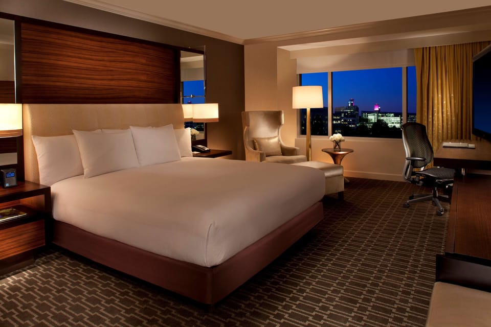 Premium bedding, down comforters, pillowtop beds, in-room safe