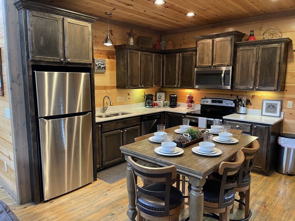 Well appointed kitchen with everything you need for your cabin time.  Starter supplies provided.