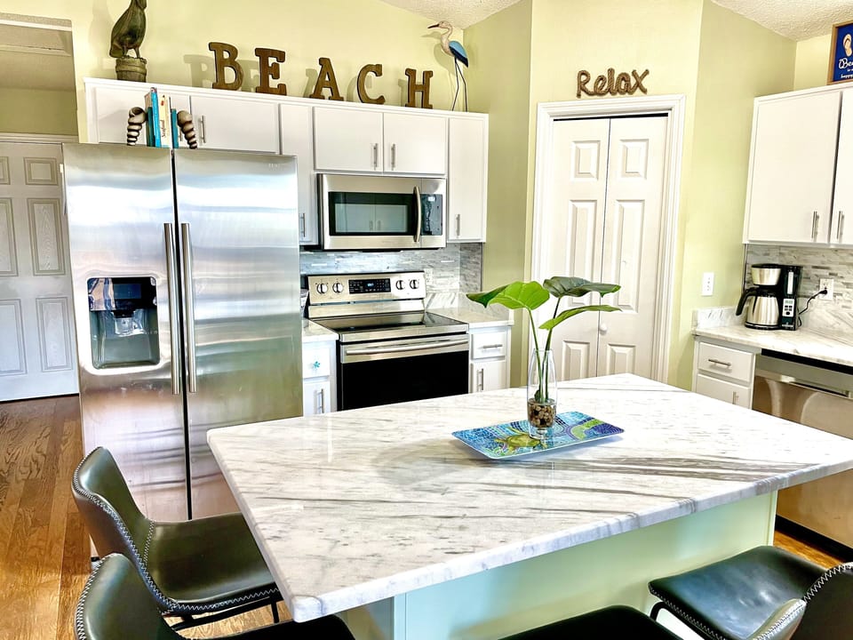 Granite counters, a large island and stainless appliances you'll feel at home