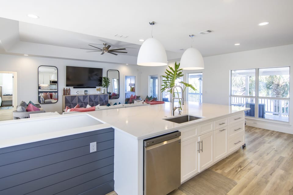 2nd fl open concept living w/ wide kitchen, dining area & spacious living room. 