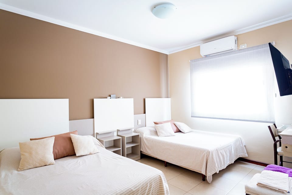 Standard Quadruple Room | Down comforters, free WiFi, bed sheets